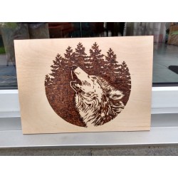 Wolf head in front of trees